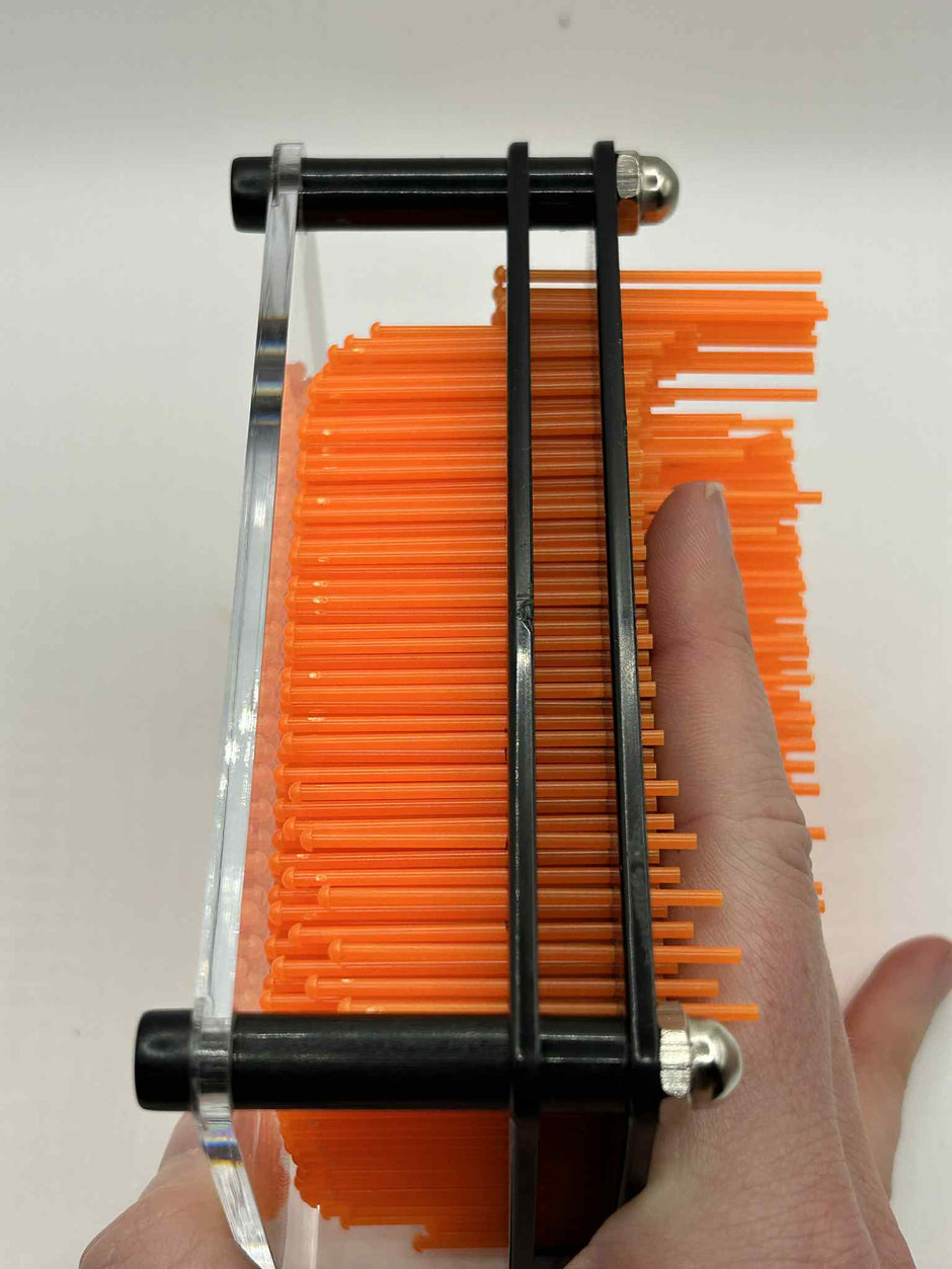 Hand pressing into Neuro Touch 3D Impression Kit – tactile sensory tool for focus and calm by The Divergent Den