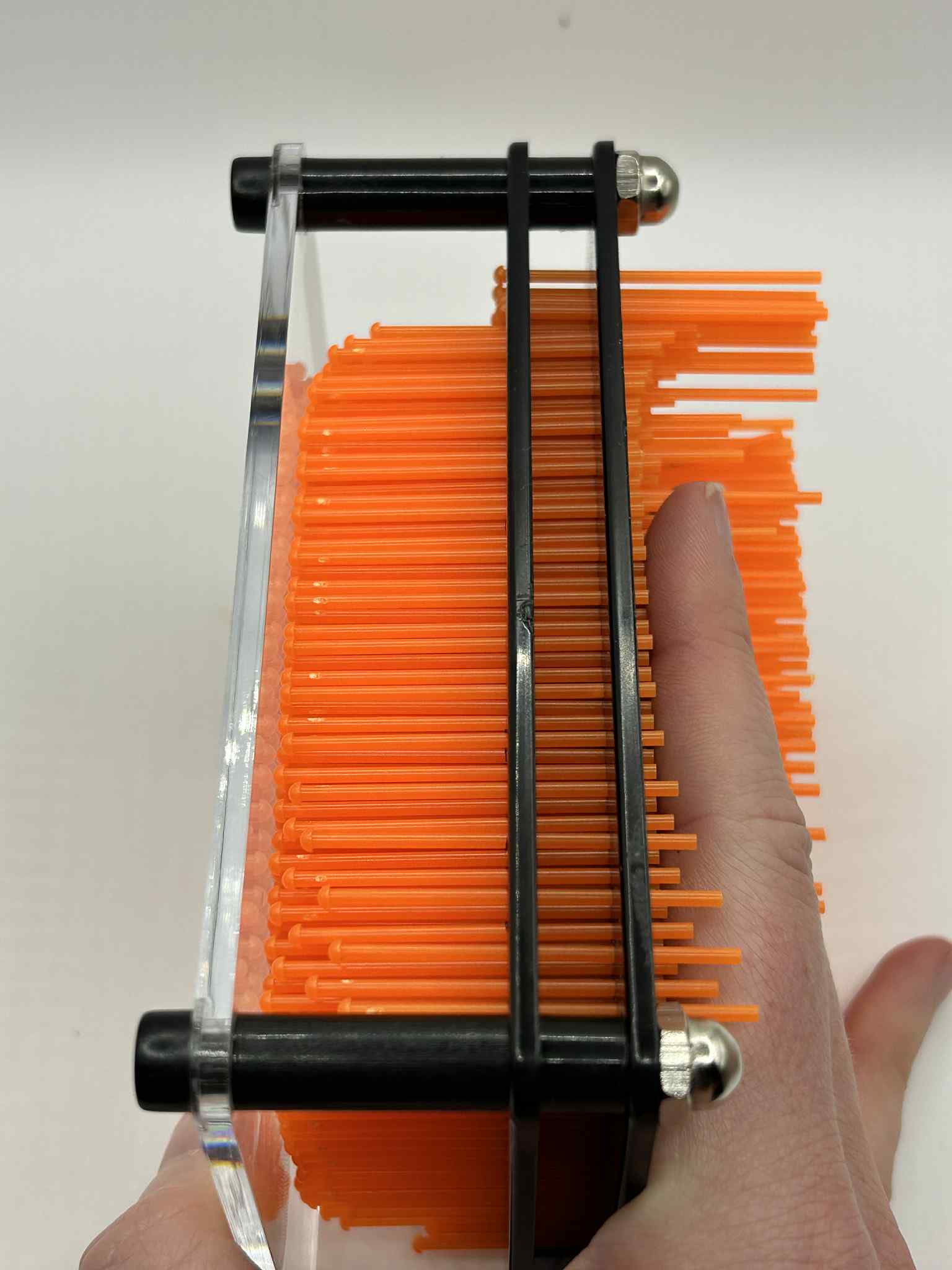 Hand pressing into Neuro Touch 3D Impression Kit – tactile sensory tool for focus and calm by The Divergent Den