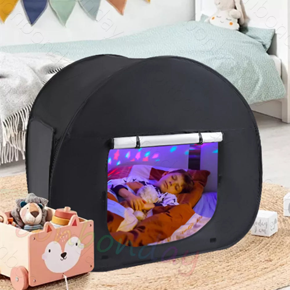 Child sleeping inside Blackout Sensory Tent for autism and ADHD-friendly calming and quiet space
