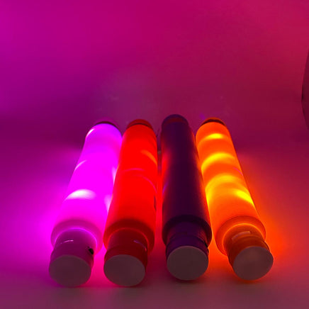 Sensory Light Up Pop Tubes Pack of 4 laid out to see the colours lighting up – flexible fidget toy with LED lights for neurodivergent children | The Divergent Den