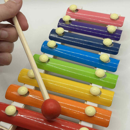 Close-up of Wooden Xylophone showing colourful wooden keys and mallets for tactile and auditory play