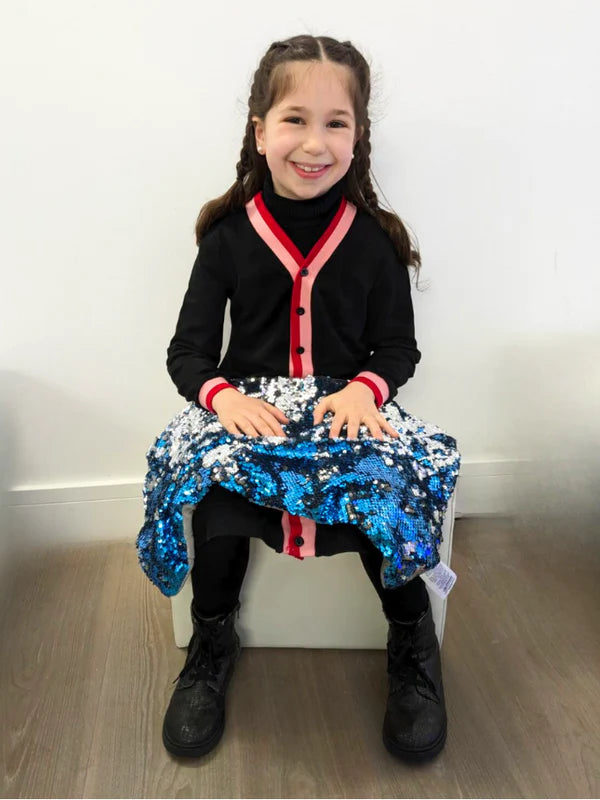 Child using 2.3kg Weighted Lap Pad on lap for focus during homework and tasks