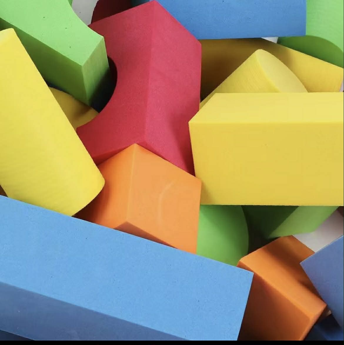 Close-up of Sensory Foam Blocks 46-Piece Set showing vibrant foam blocks with different shapes for tactile play