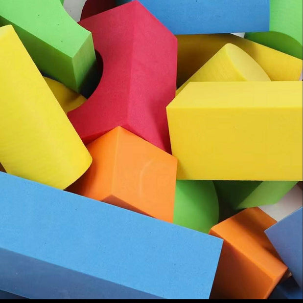 Close-up of Sensory Foam Blocks 46-Piece Set showing vibrant foam blocks with different shapes for tactile play