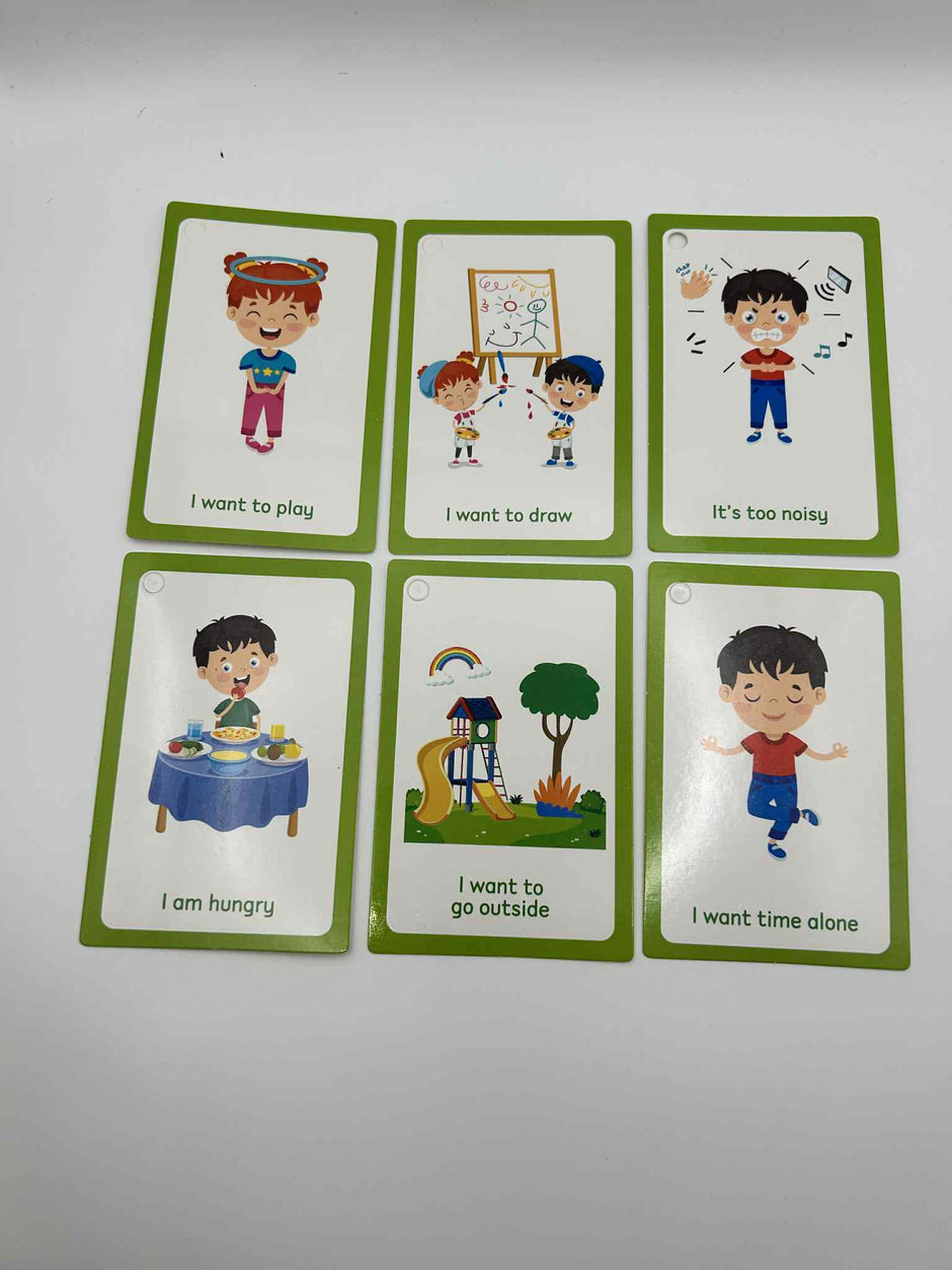 Close-up of communication flash cards with emotions and actions – The Divergent Den sensory learning tool