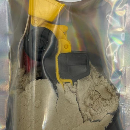 Close-up of Construction Sensory Set showing kinetic sand and miniature construction tools for sensory play