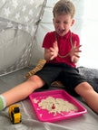 Child playing with Construction Sensory Set with Kinetic Sand for autism and ADHD-friendly tactile stimulation