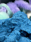 Close-up of Create Your Own Monster Sensory Set showing colourful modelling materials and tools for sensory play