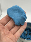 Close-up of colourful modelling sand from Create Your Own Monster Sensory Set for tactile sensory play