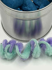Close-up of pipe cleaners from Create Your Own Monster Sensory Set for tactile sensory play