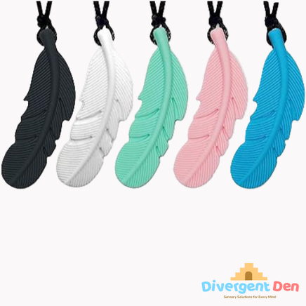 Five oral sensory feather-shaped necklaces in black, white, green, pink, and blue on a white background with 'Divergent Den' branding.