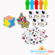 Assorted toys including a colorful cube, butterfly-shaped toy, animal figurines, and a sheet of stickers on a white background with 'Divergent Den' branding.