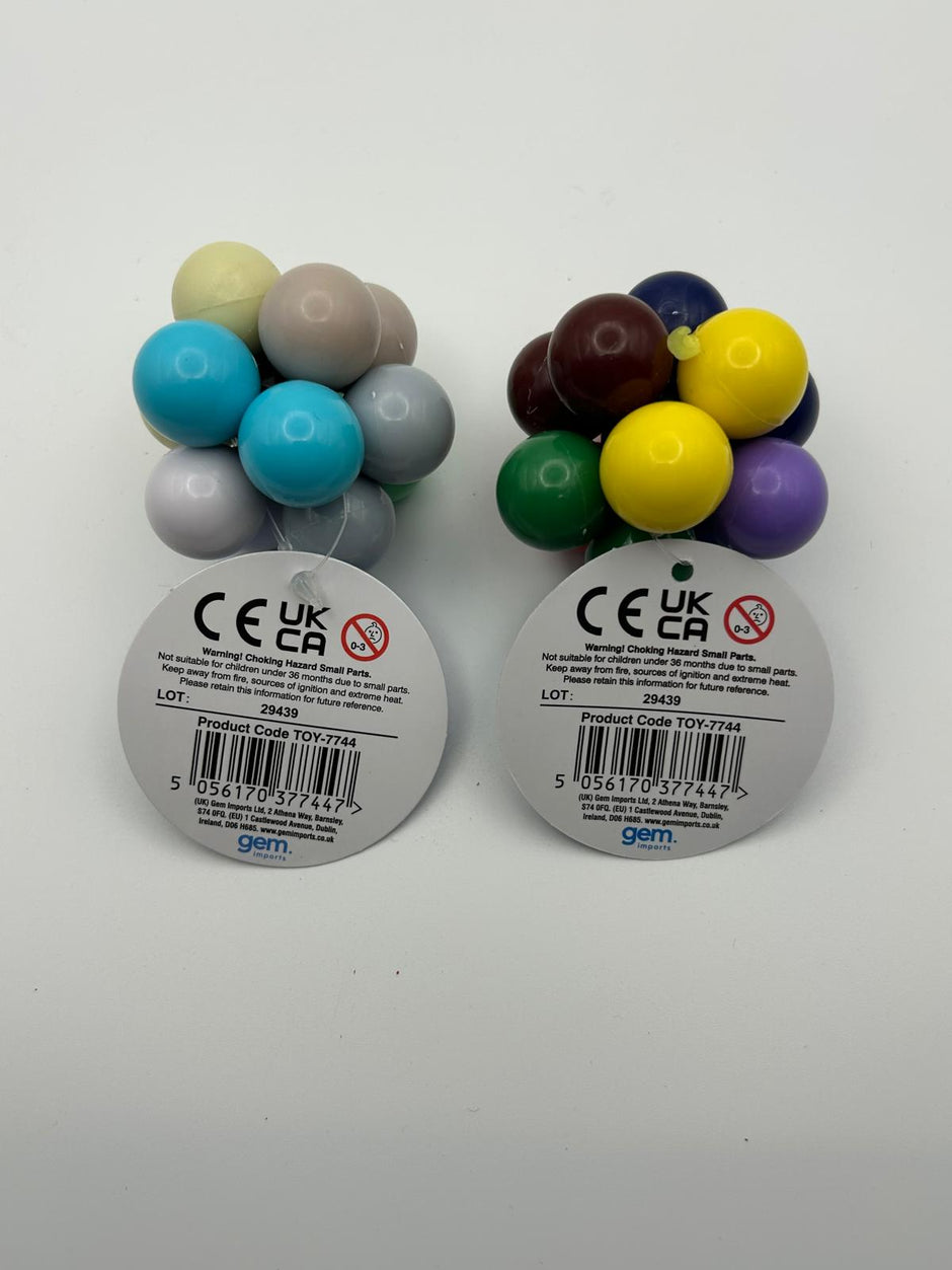 two Fidget Atoms showing multi-coloured tactile buttons for stress relief and focus