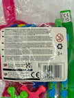 Back of a package with colorful fidget spinners and safety warning labels.