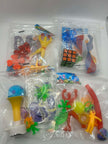 Assorted sensory fidget toys toys in clear plastic bags on a white background for neurodivergent people
