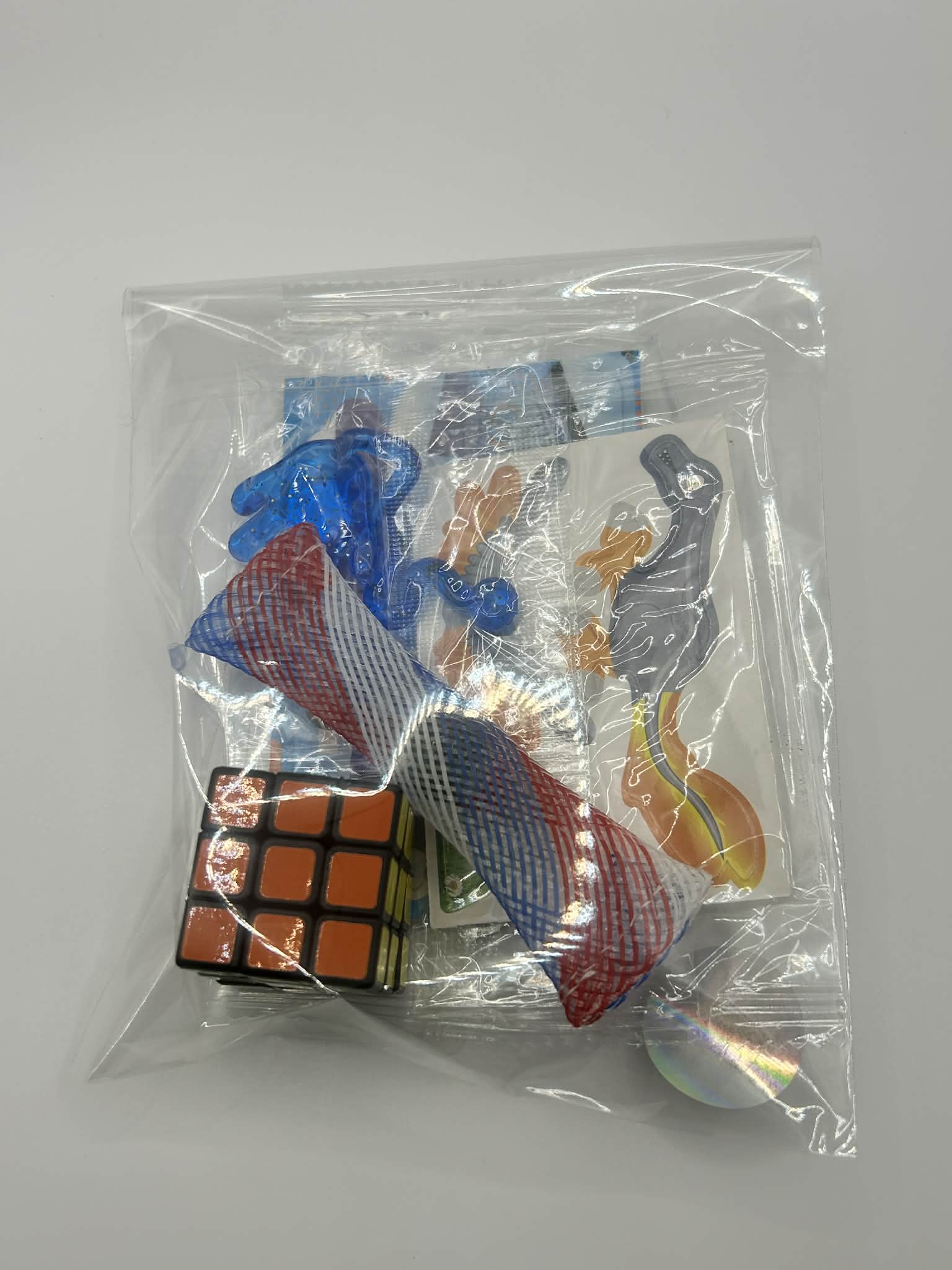  Colourful fidget toys including wall climbers and dinosaur sticky cards for focus and calming