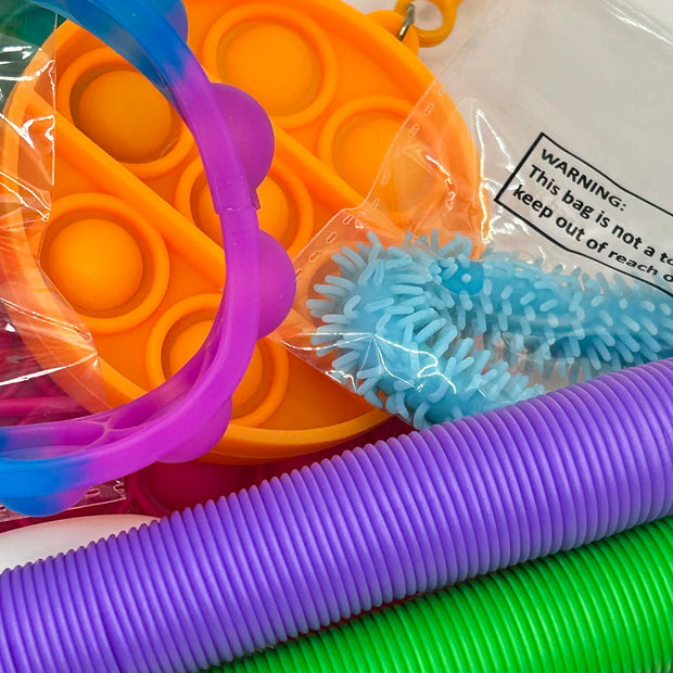 Curated fidget bundle with 9, 12 and 20 piece premium sensory tools including stress balls, fidget spinners, and tactile manipulatives for focus and calm