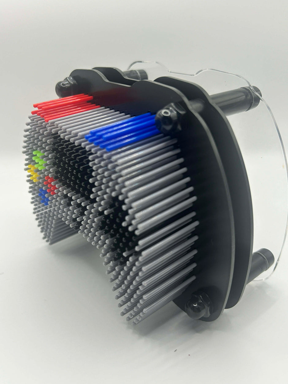 hand impression created with games controller pin art sensory fidget toy