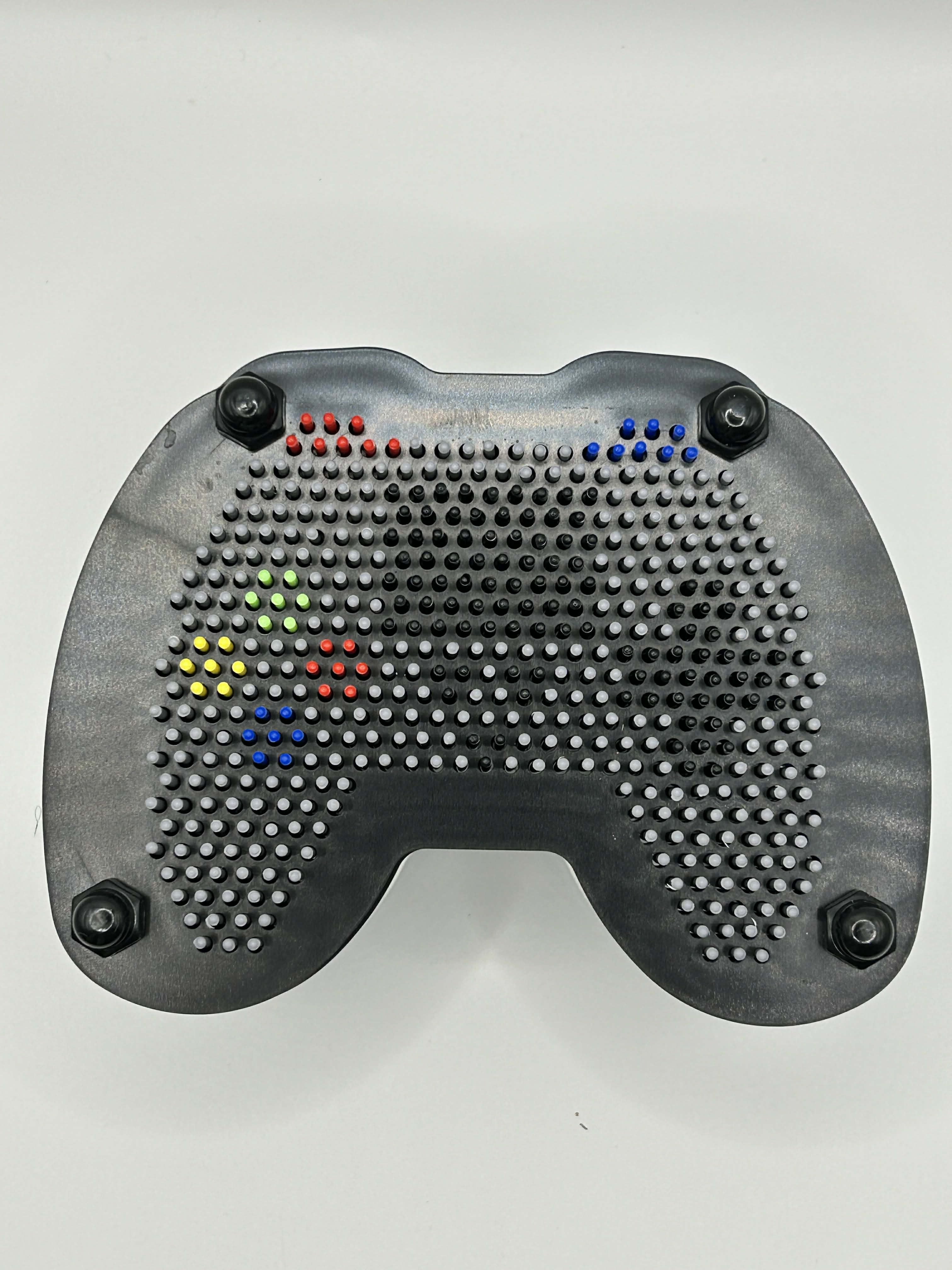 hand impression created with games controller pin art sensory fidget toy