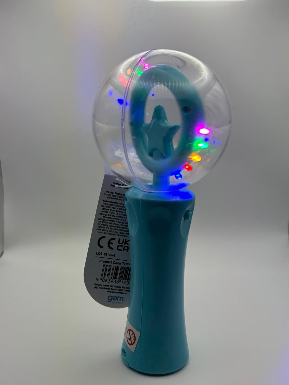 Blue Glow Spinning Wand in action lit up with multi colours– light-up sensory toy for neurodivergent children | The Divergent Den