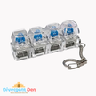 Clear sensory keychain with blue buttons on a white background, featuring the Divergent Den logo.