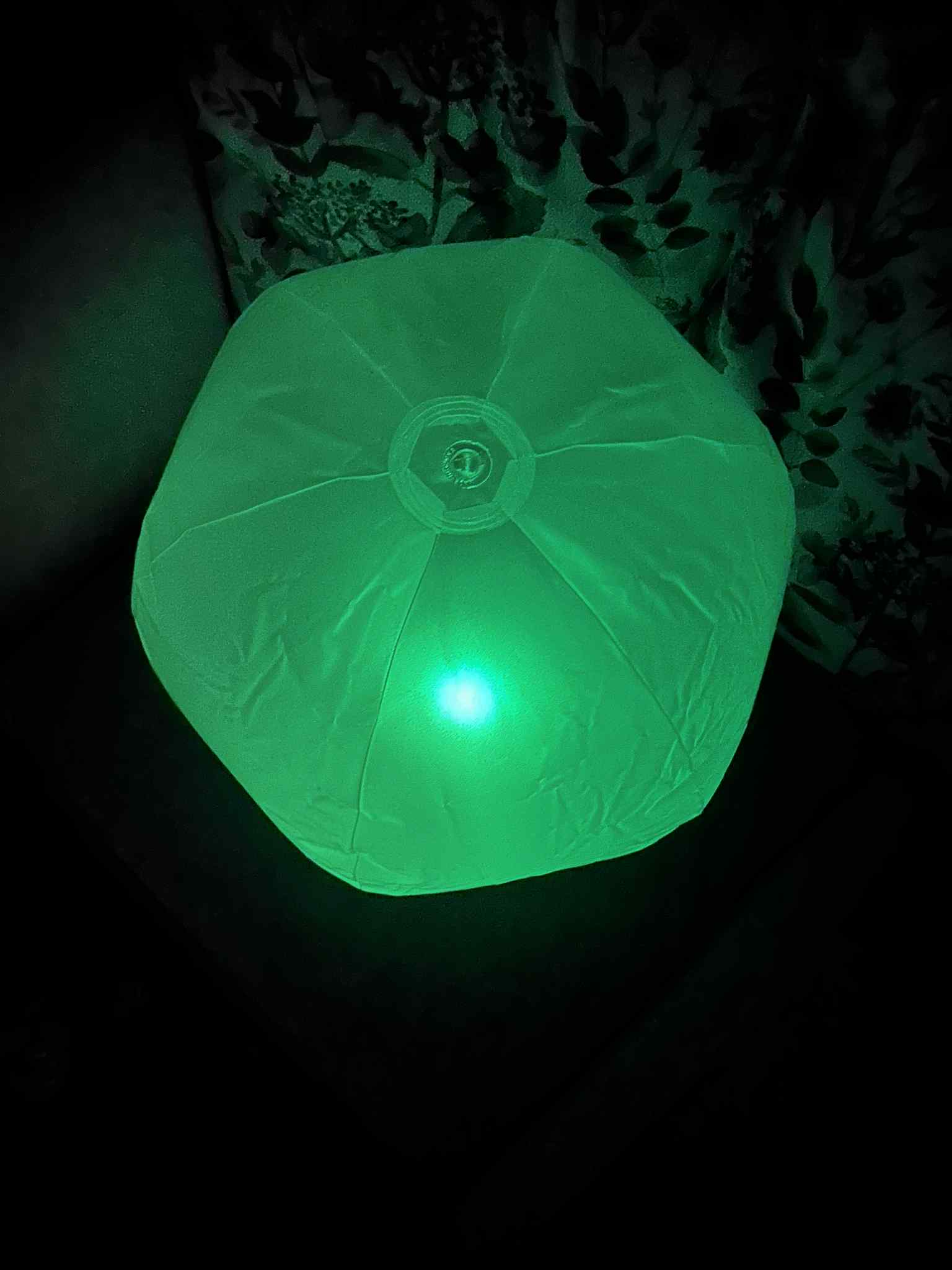 Inflatable 45cm Glow Ball glowing bright green– sensory light toy for kids by The Divergent Den