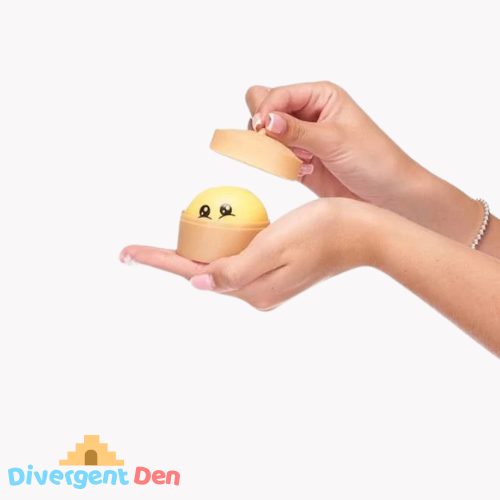 Kawaii Squishy Squeezy Dumpling in Basket In Use - Showing the basket in a hand to show the size from The Divergent Den