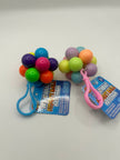 Two Keyring fidget Atoms showing multi-coloured tactile buttons for stress relief and focus