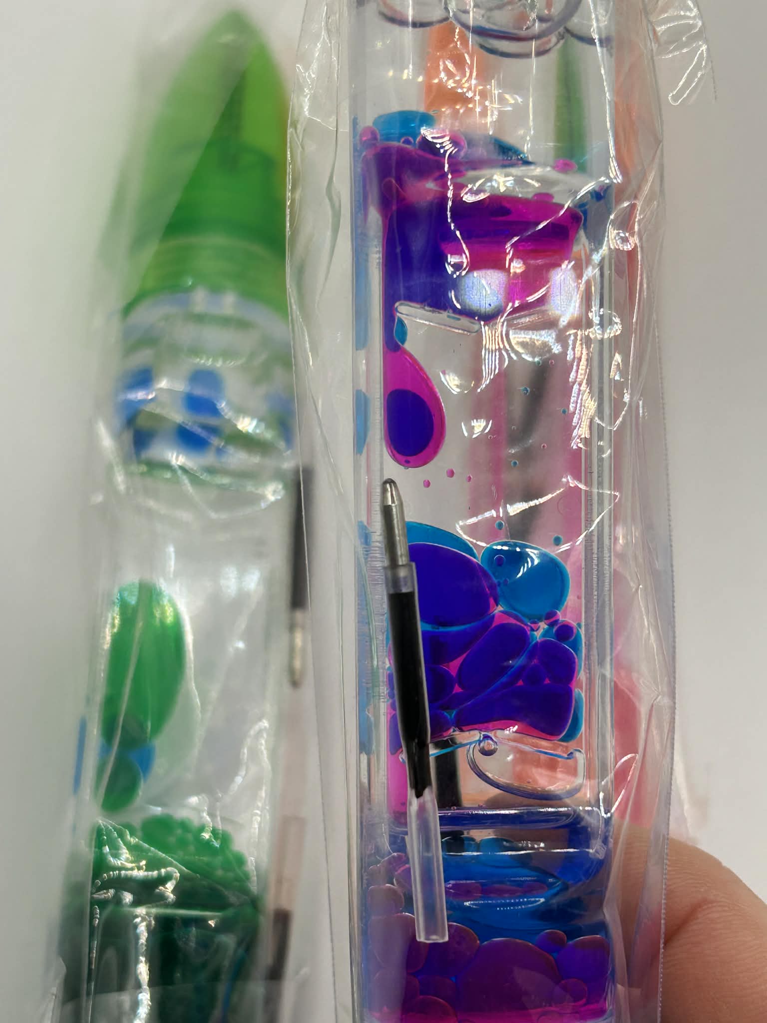 Liquid motion pen for calming stimulation for neurodivergent children and adults 