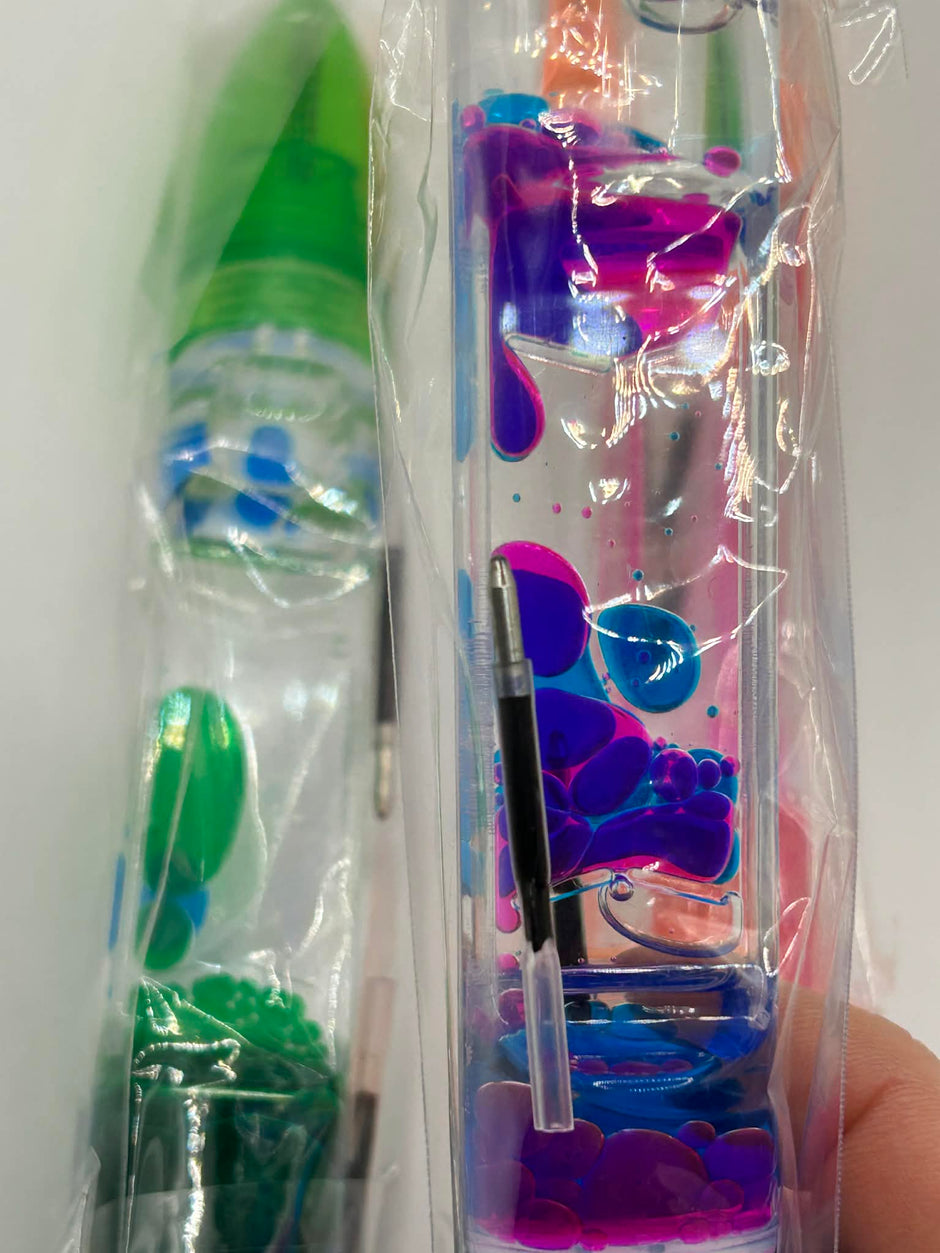 close up on the bubble falling in the Liquid motion pen for calming stimulation for neurodivergent children and adults 