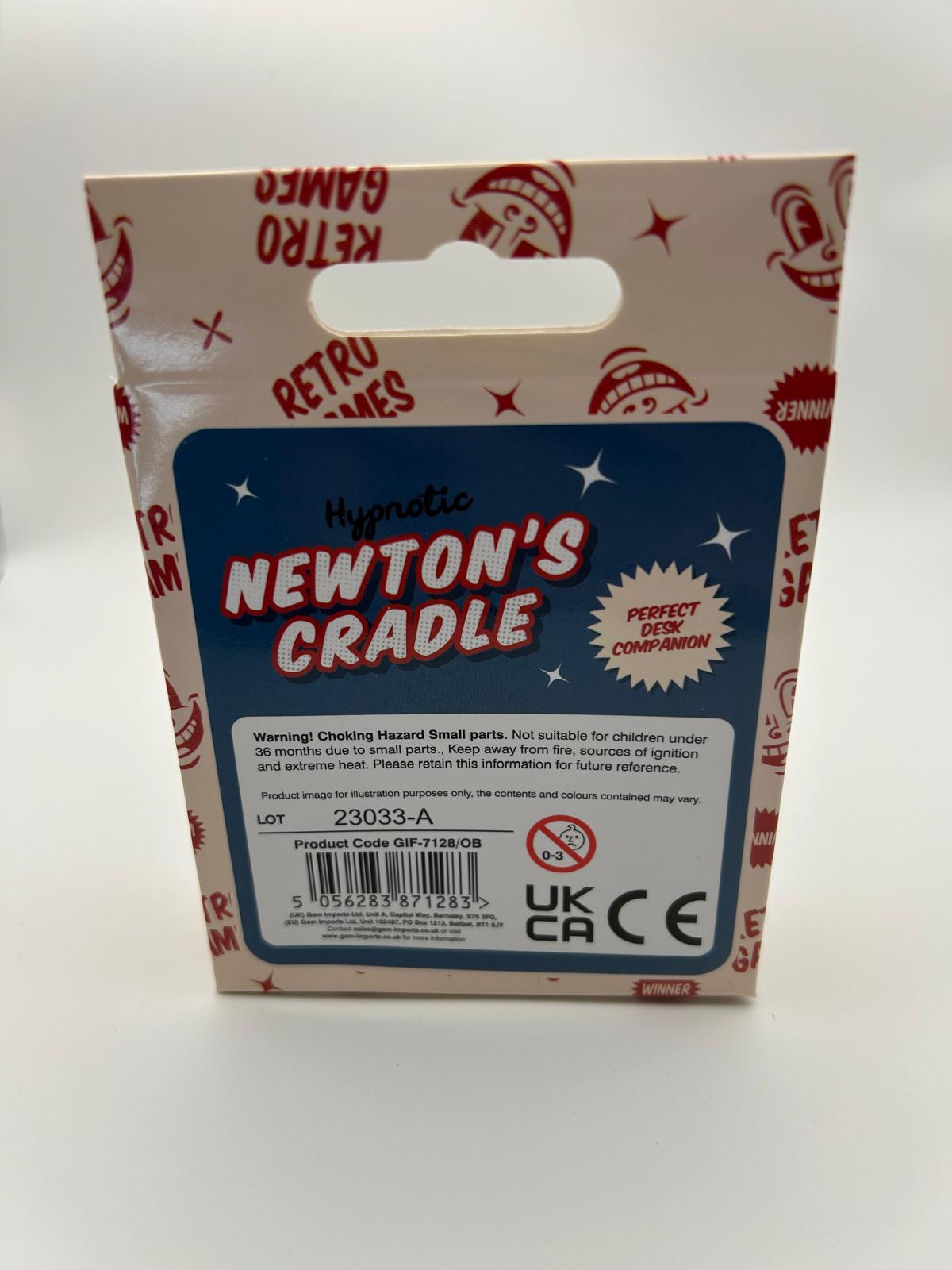 Newton’s Cradle packaging from the back to show the UKCA label is on there – desktop fidget and sensory stress relief toy | The Divergent Den