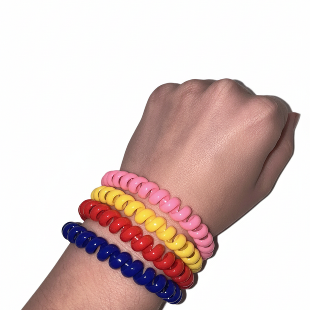 Child wearing Chew & Oral Sensory Bracelet on wrist - oral sensory tool for school and public