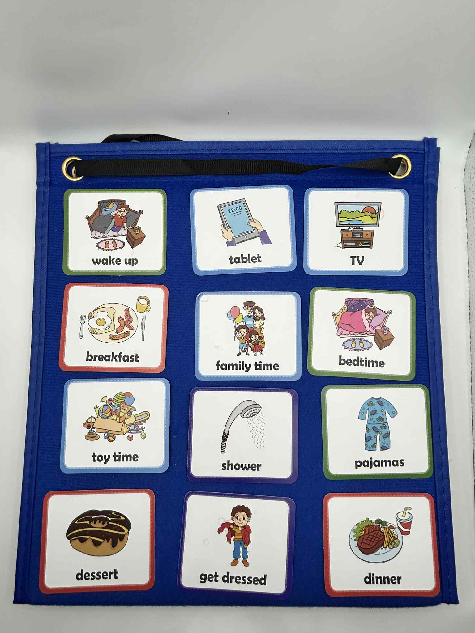Close-up of PECS Visual Timetable Board showing illustrated activity cards and Velcro layout