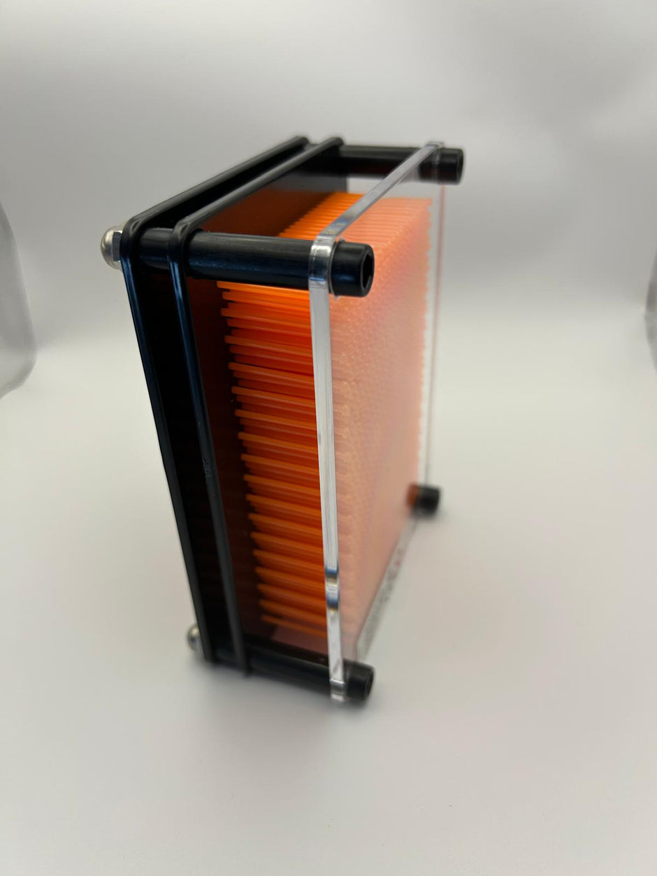 Neuro Touch 3D Impression Kit – sensory pin art toy for autism and ADHD by The Divergent Den on the side angle to see the orange pins 