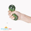 Sensory Bead Ball Fidget being shown when squeezed 