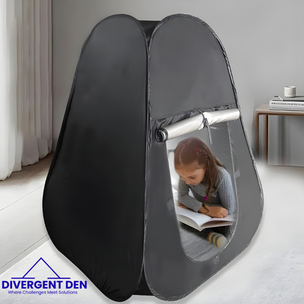Sensory Blackout Tent with a child inside, sitting on a white floor with a neutral background. | The Divergent Den