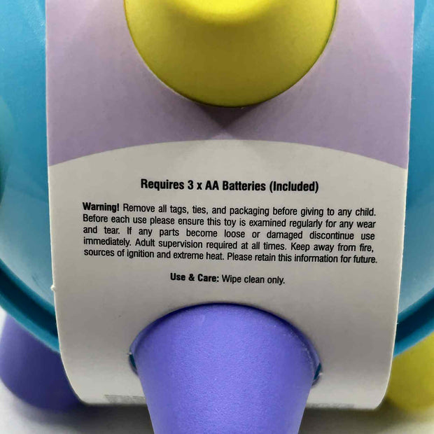 Sensory Bumpie Ball showing the battery info and the warning label – tactile fidget and stress-relief toy for neurodivergent children | The Divergent Den”