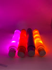 Sensory Light Up Pop Tubes Pack of 4 laid out to see the colours lighting up – flexible fidget toy with LED lights for neurodivergent children | The Divergent Den