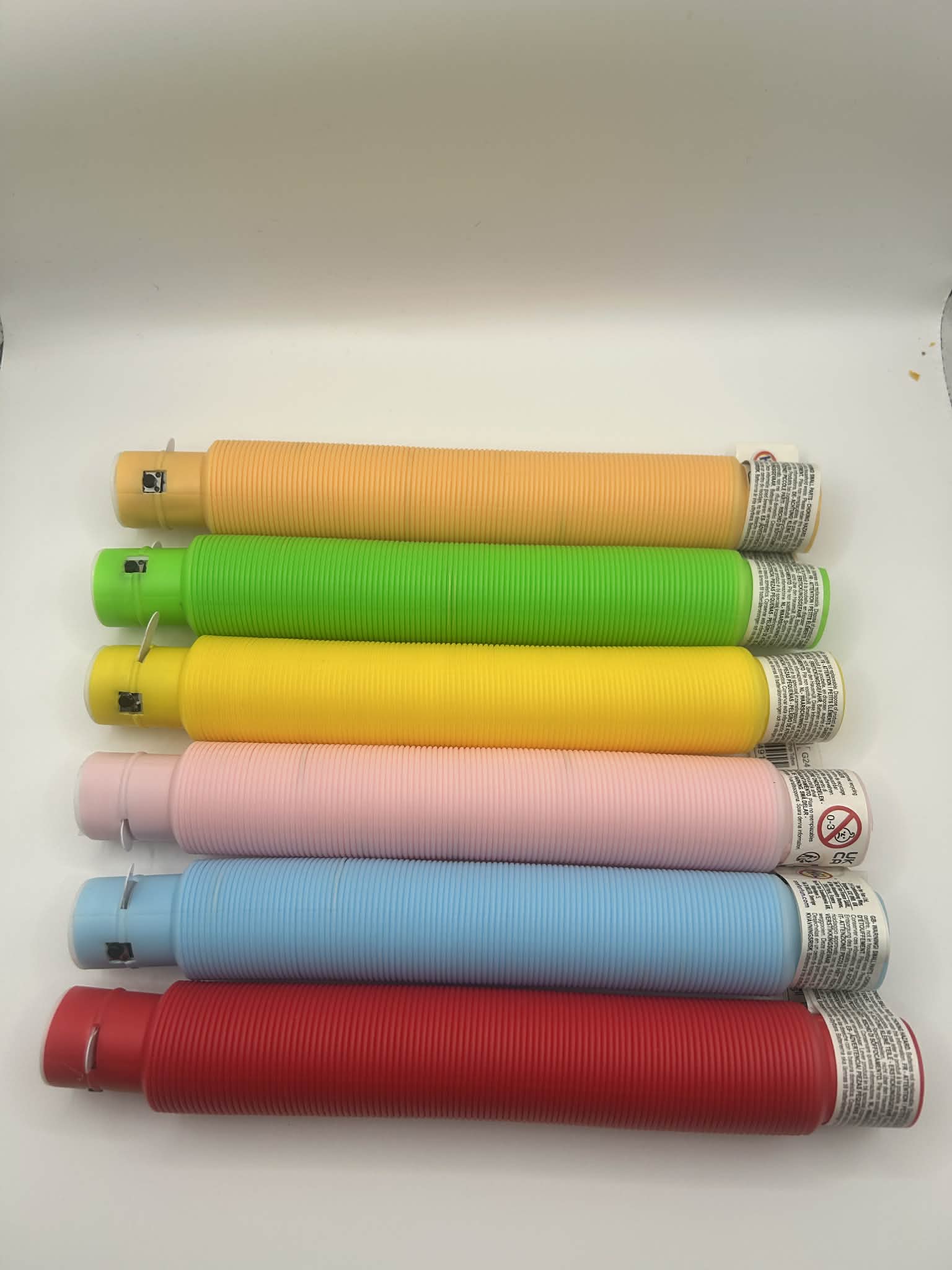 Sensory Light Up Pop Tubes, light showing the colours without the led turned on – flexible fidget toy with LED lights for neurodivergent children | The Divergent Den