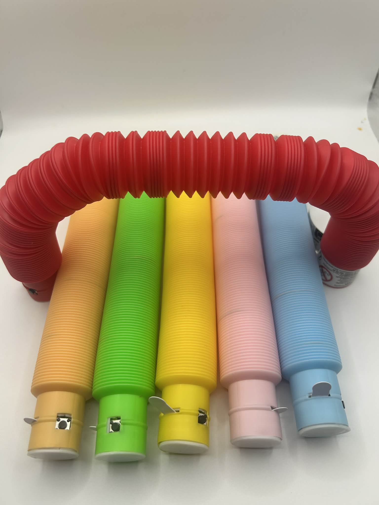 Sensory Light Up Pop Tubes, light showing the colours without the led turned on – flexible fidget toy with LED lights for neurodivergent children | The Divergent Den