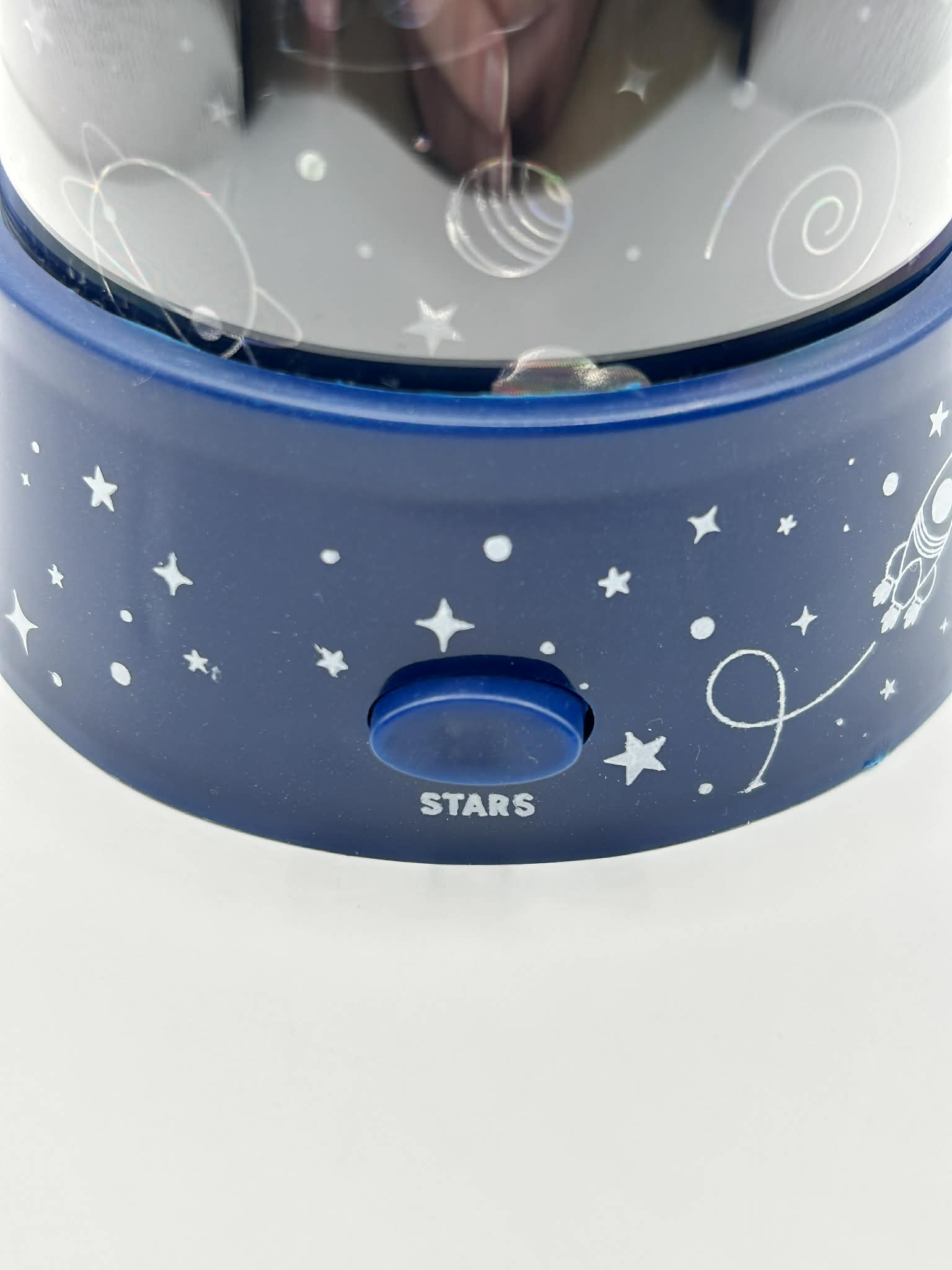 Close up on the LED switch to turn on the LED lighting effect projecting space images for those neurodivergent people needing to feel calm 