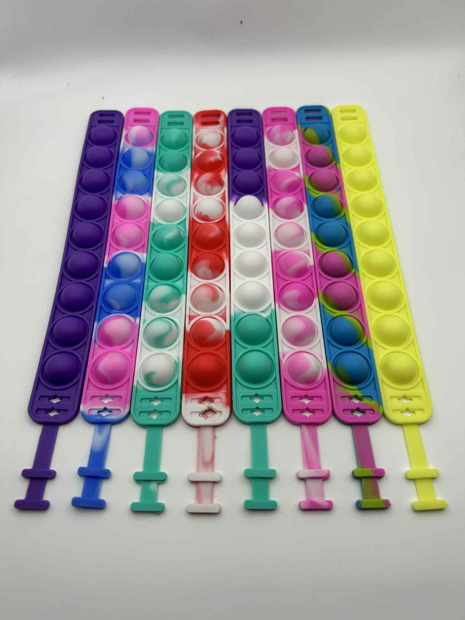 Sensory Pop Bracelet showing all the colours we offer– colourful tactile fidget accessory for neurodivergent children | The Divergent Den