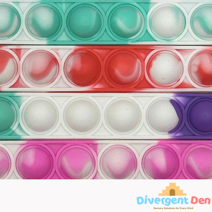 Close up on the Sensory Pop Bracelet – colourful tactile fidget accessory for neurodivergent children | The Divergent Den