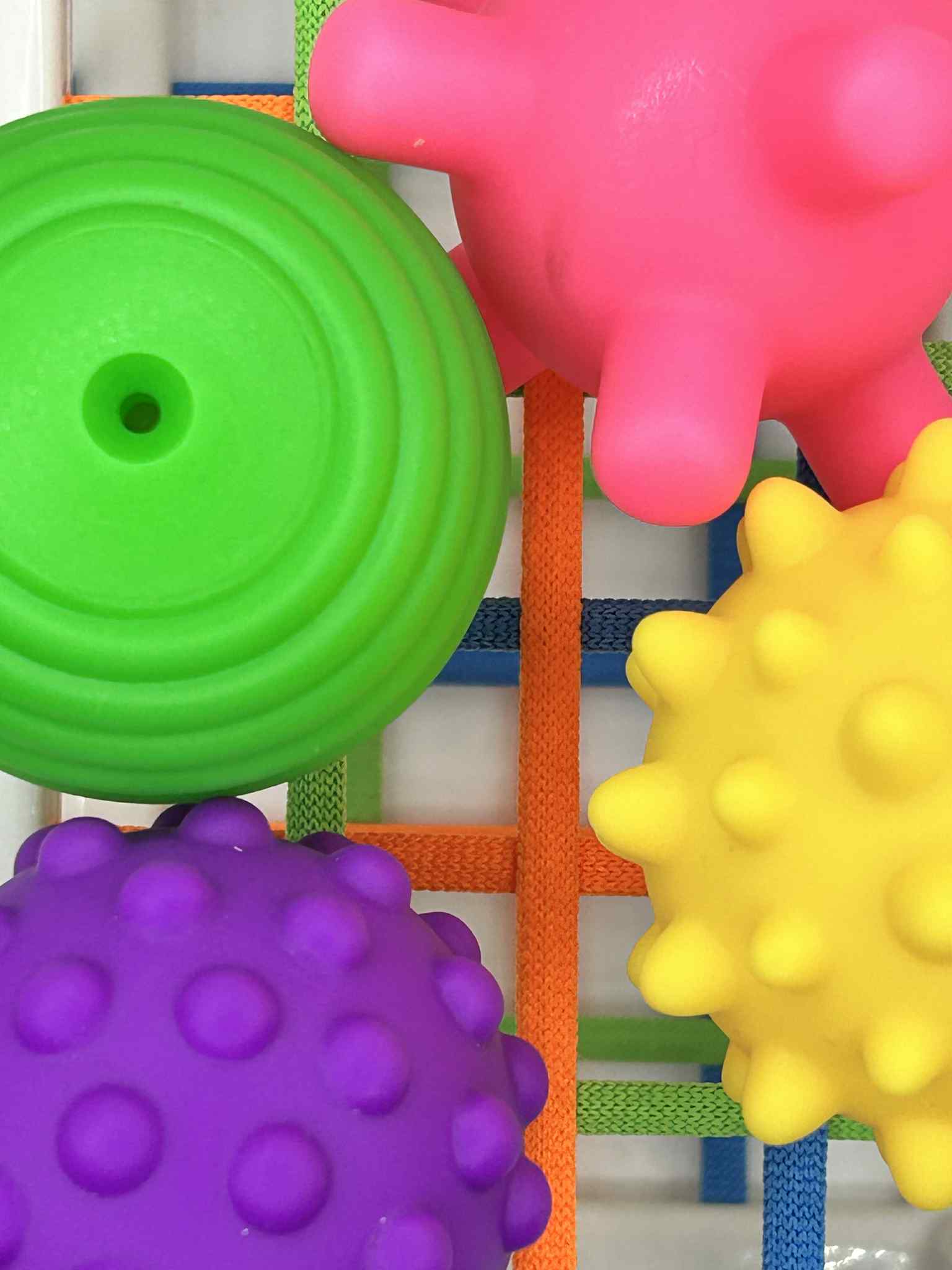 Colorful textured balls on a striped background