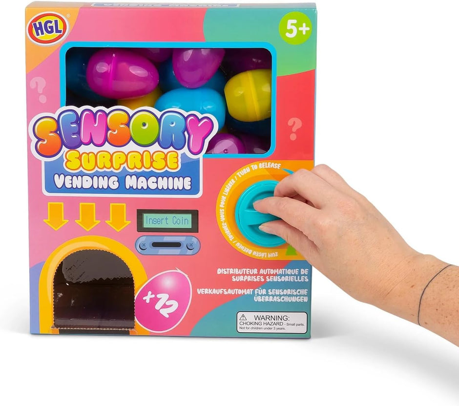 Child using Sensory Surprise Vending Machine to dispense surprise fidget toy
