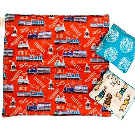 Close-up of sensory weighted lap pad and bean bags in Train Pattern – calming deep pressure aid by The Divergent Den