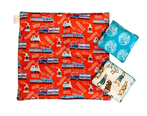 Close-up of sensory weighted lap pad and bean bags in Train Pattern – calming deep pressure aid by The Divergent Den