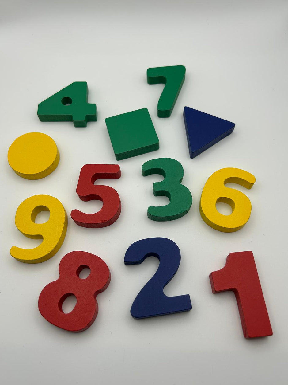 Close-up of Wooden Shape Sorter showing colourful wooden blocks and shape-matching holes for learning play