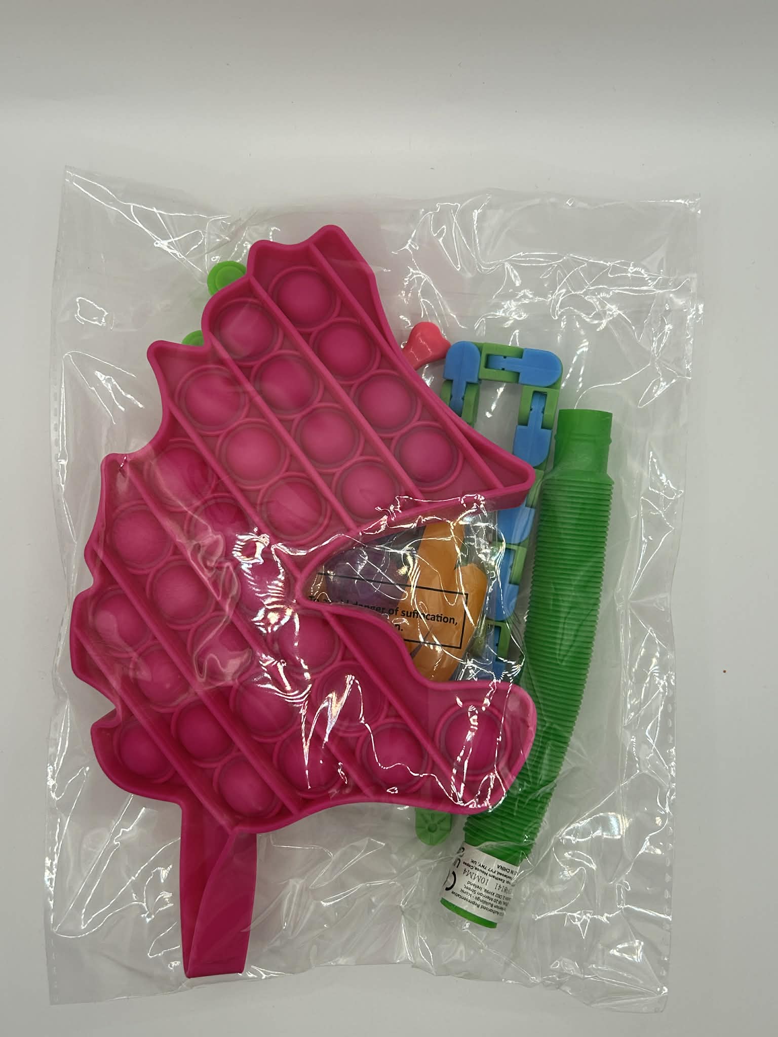 Packing for the Comprehensive fidget bundle featuring 15-20 sensory tools for calming, focus, and fine motor skill development