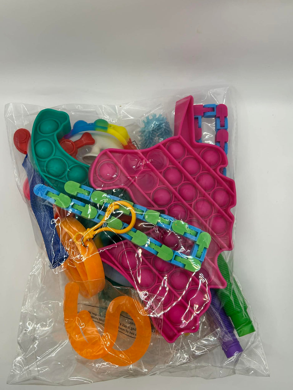 Packaged colorful pop-it fidget toys on a white background